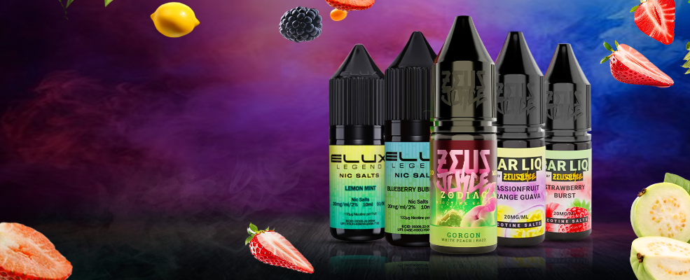 Five black vape juice bottles with colorful labels on a dark background with fruit graphics.